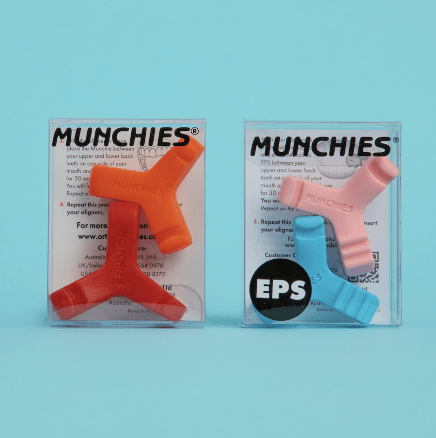Front, close-up view of Munchies® EPS 3-piece white carrying case and Original Munchies® 3-piece white carrying case